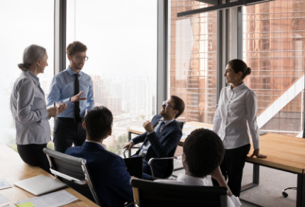Group of business people brainstorming in an office.